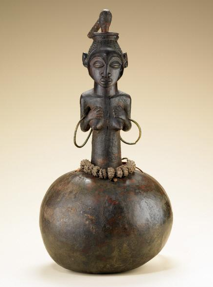  Among the Luba, the Bugabo Society was an association of men and women dedicated to hunting, healing and fighting crime. The protective spirit of the society was represented by a gourd filled with powerful medicines and topped by a carved figure. 