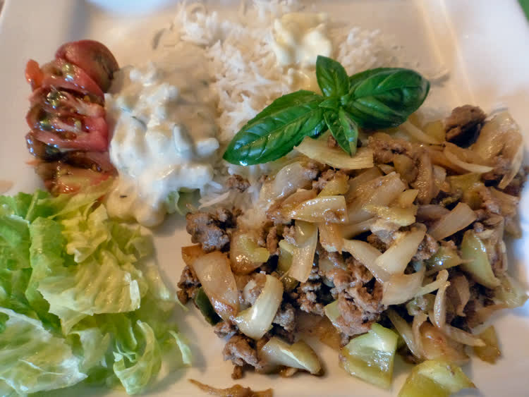 Lunch - Fried cabbage & beef with rice and salad.