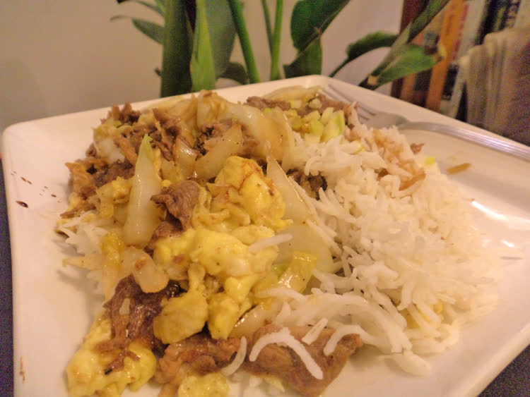Chinese scrambled egg, beef strips, napa cabbage, with white basmati rice.