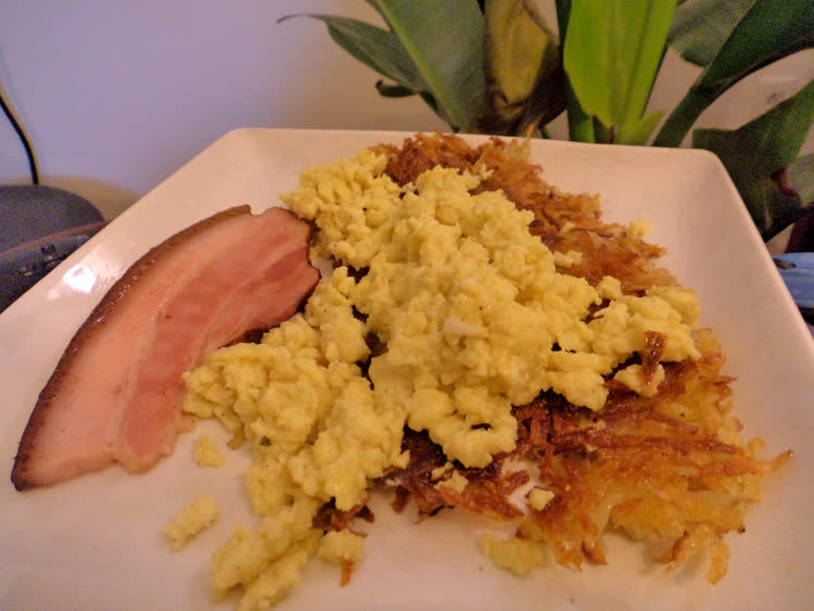 Bacon from Andy's, scrambled eggs and rosti. 