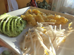 dec -  scrambled eggs with thin slices of edam-like cheese on top. Beansprouts, and sliced avocado.