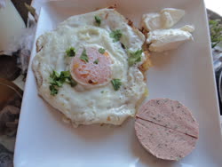 may -  Fried egg on rosti with liverwurst